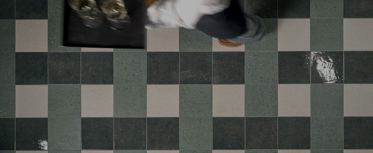 Restaurant interior with Marca Corona Terrasale tiles in green and sand tones.