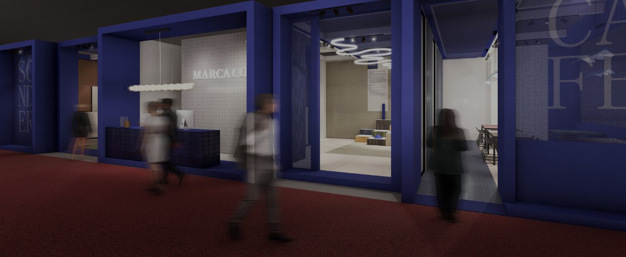 Render of the Marca Corona stand with a blue facade, illuminated reception desk, and visitors walking by.