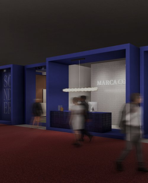 Render of the Marca Corona stand with a blue facade, illuminated reception desk, and visitors walking by.