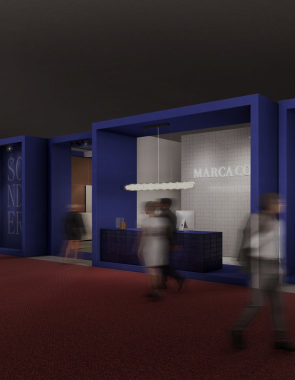 Render of the Marca Corona stand with a blue facade, illuminated reception desk, and visitors walking by.