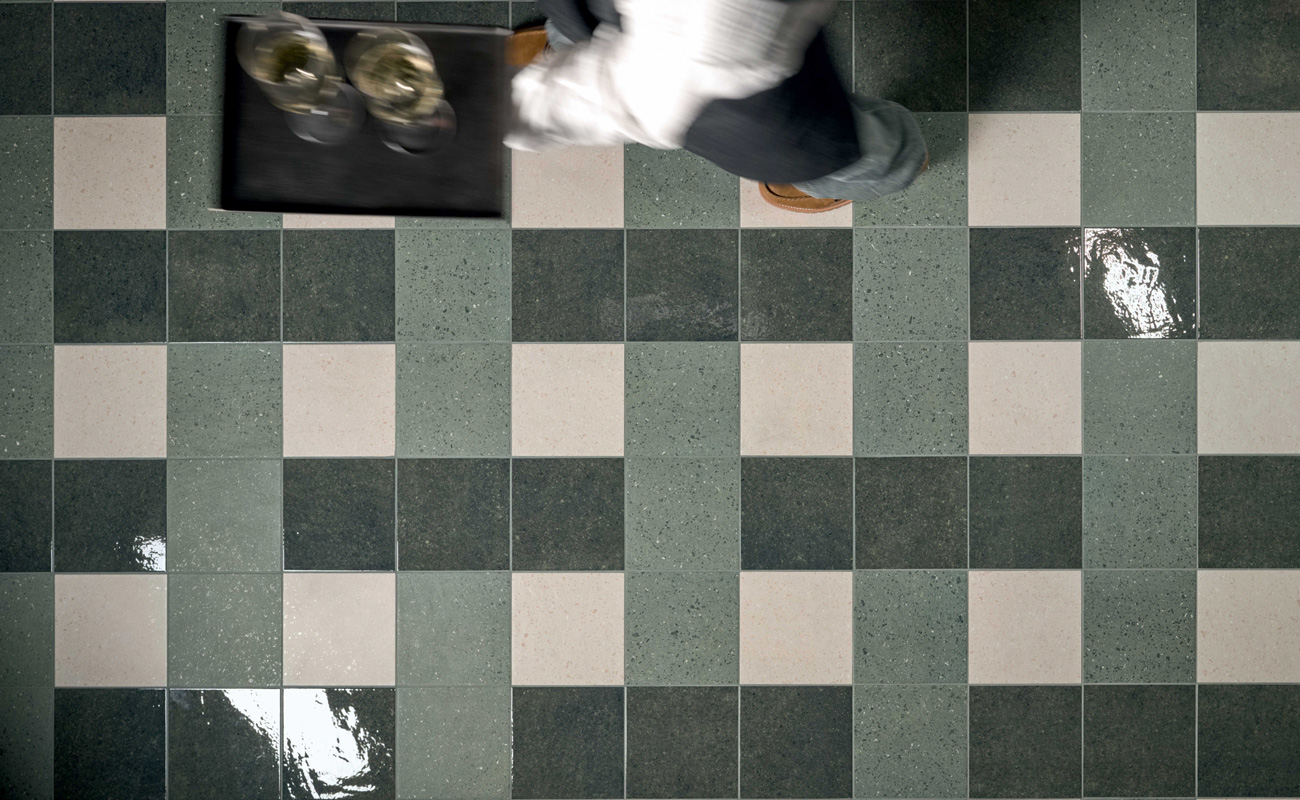 Restaurant interior with Marca Corona Terrasale tiles in green and sand tones.