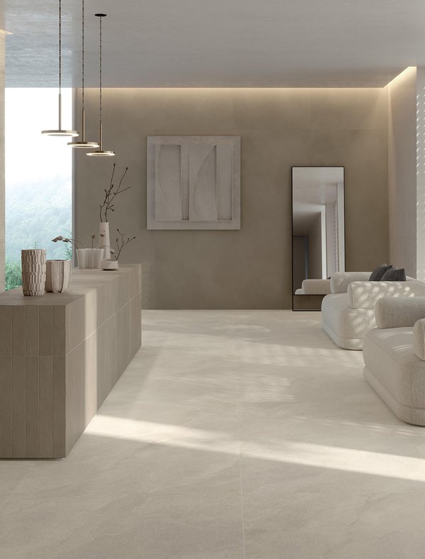 Outdoor terrace with stone‑effect porcelain flooring and dining table.