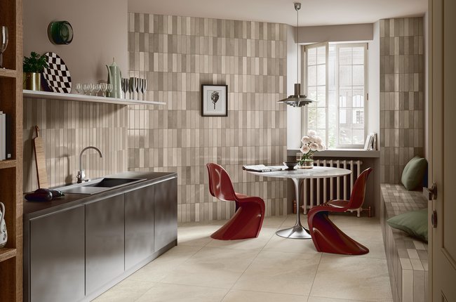 Modern kitchen with walls covered in glossy beige tiles.