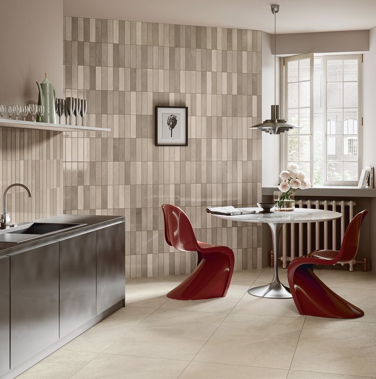 Modern kitchen with walls covered in glossy beige tiles.