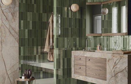 Bathroom with glossy green tiles