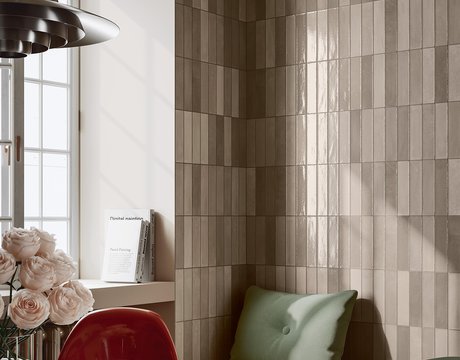 Kitchen with beige tiles and built-in seating