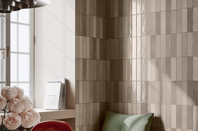 Kitchen with beige tiles and built-in seating