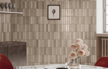 Kitchen wall with vertical beige tiles