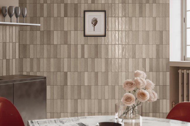 Kitchen wall with vertical beige tiles