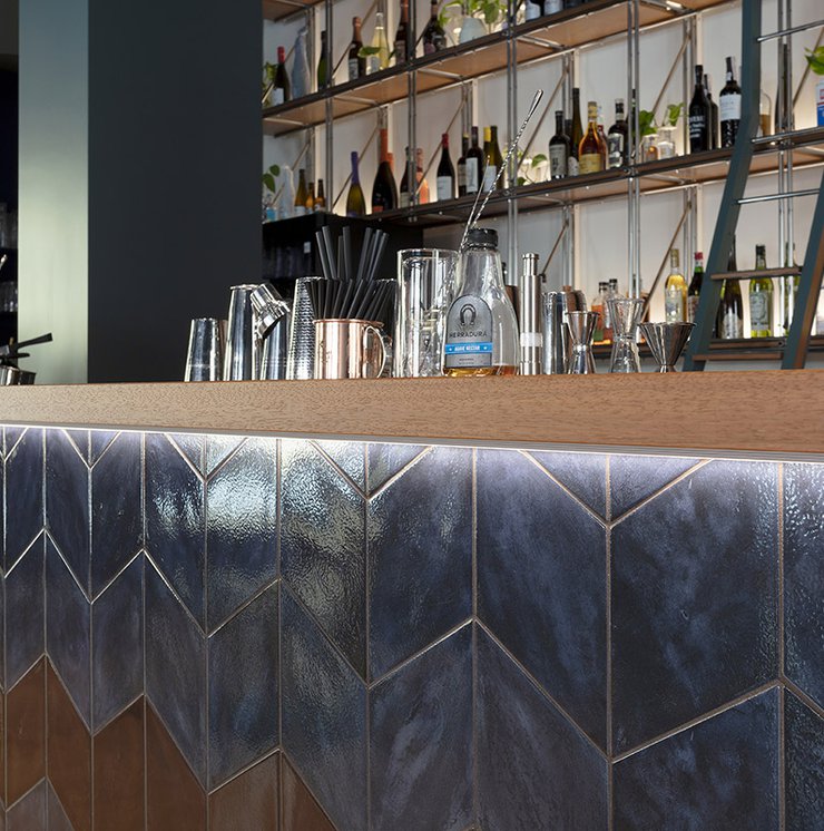 Merlo Cocktail Bar: Marca Corona porcelain stoneware tiles